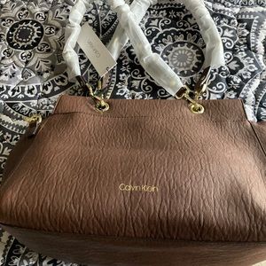 Brand new Calvin Klein brown leather bag with tags